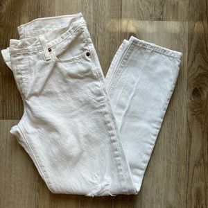 White Levi’s 501 distressed boyfriend jeans
